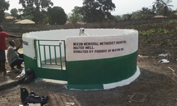 Water well and pump Nixon Memorial Hospital Logo